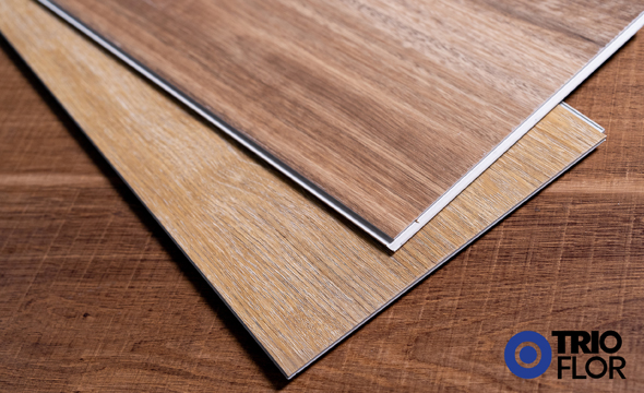 You may have narrowed your flooring selection down to vinyl plank flooring, but if you have also opted for a waterproof option, you still have a few choices to consider. Both wood and stone plastic composite cores are available, and you will want to know which one best fits your requirements, which we will discuss briefly in today’s post.  Luxury vinyl flooring options  If you choose a vinyl composite tile or luxury vinyl plank, you will select between stone plastic composite (SPC) and wood-plastic composite (WPC). The main difference between the two is that the WPC core comprises wood by-products, while SPC replaces the wood with stone.  Stone composite gives you a more rigid construction, offering a dense and durable construction that resists dents, dings, and scratches extremely well. Even though these materials are generally thinner than WPC, they still maintain a dense rigidity that makes them perfect for floating applications.  Wood-plastic composite maintains outstanding durability, especially in resisting scuffs, scratches, and stains, but provides more warm-to-the-touch comfort and noise-canceling properties than stone. This benefit can be especially sought-after in areas such as kitchens, where standing for extended periods is a common occurrence.
